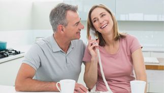 Couple talking on phone